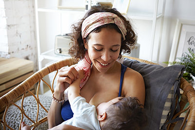 Mother nursing child